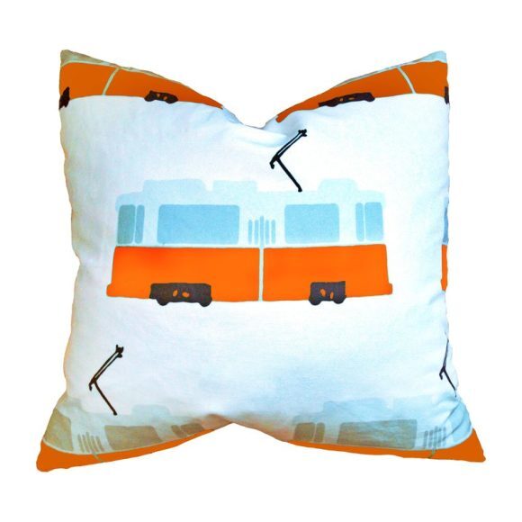 orange pillows and throws