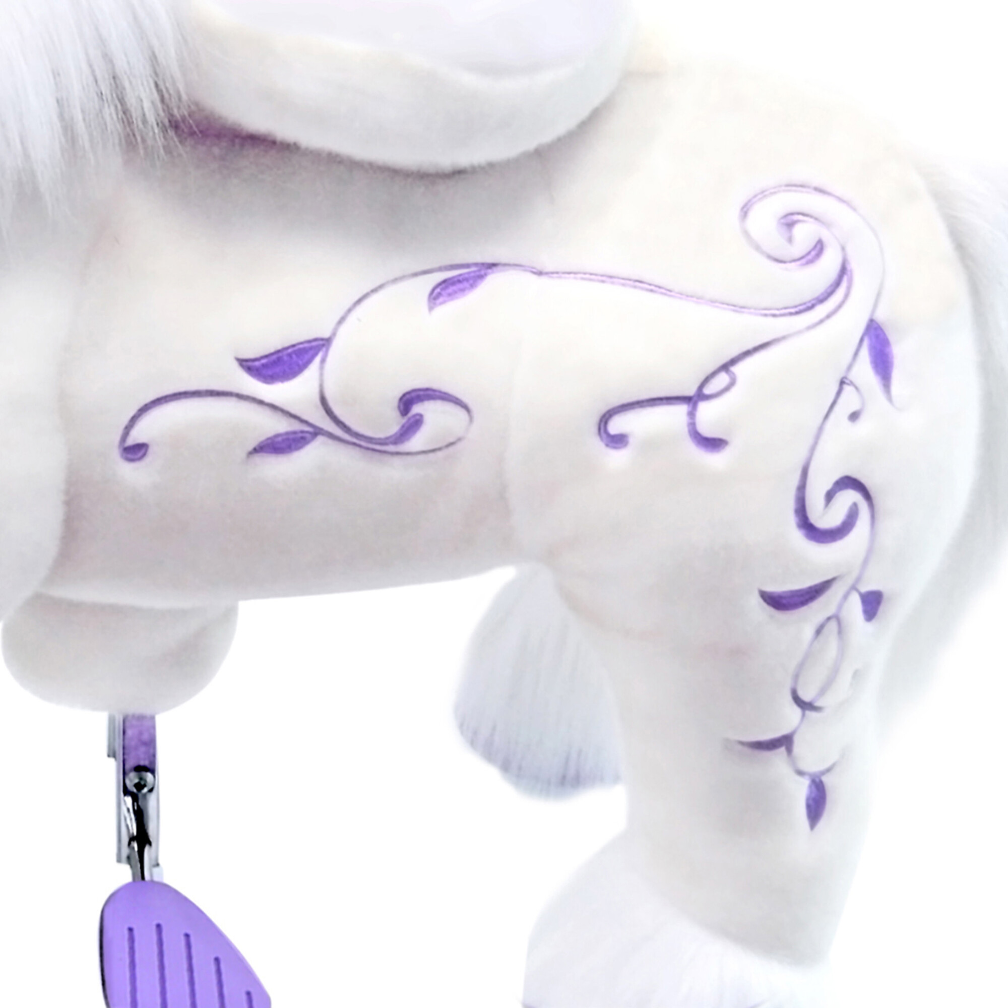 riding toy unicorn with purple horn