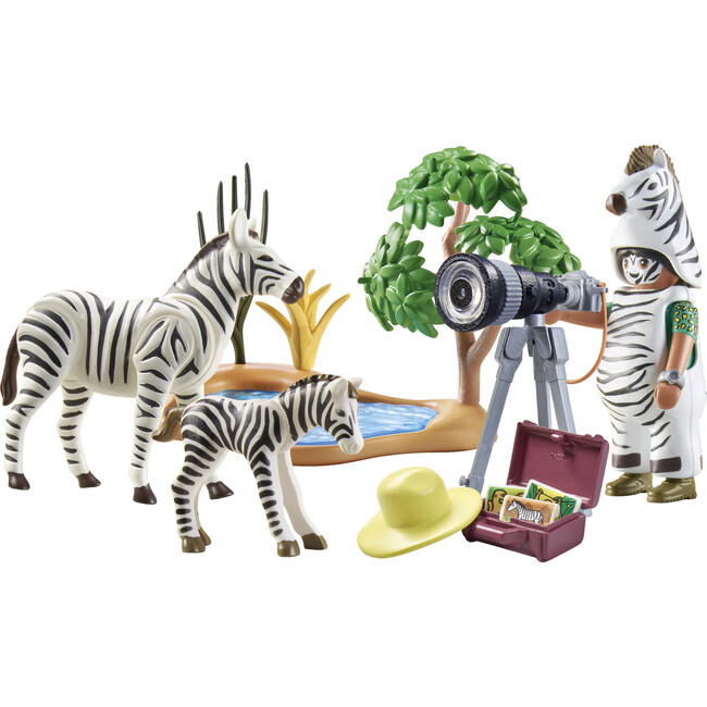 Photographer with zebras