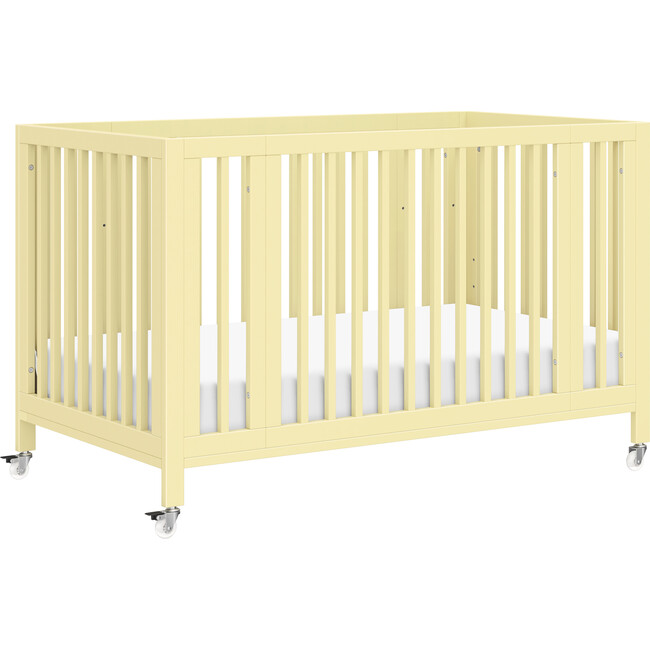 Rolli 9-in-1 Convertible All-Stages® Crib with Bassinet & Toddler Bed Conversion Kits in Pale Yellow