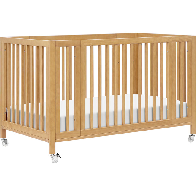 Rolli 9-in-1 Convertible All-Stages® Crib with Bassinet & Toddler Bed Conversion Kits in Honey