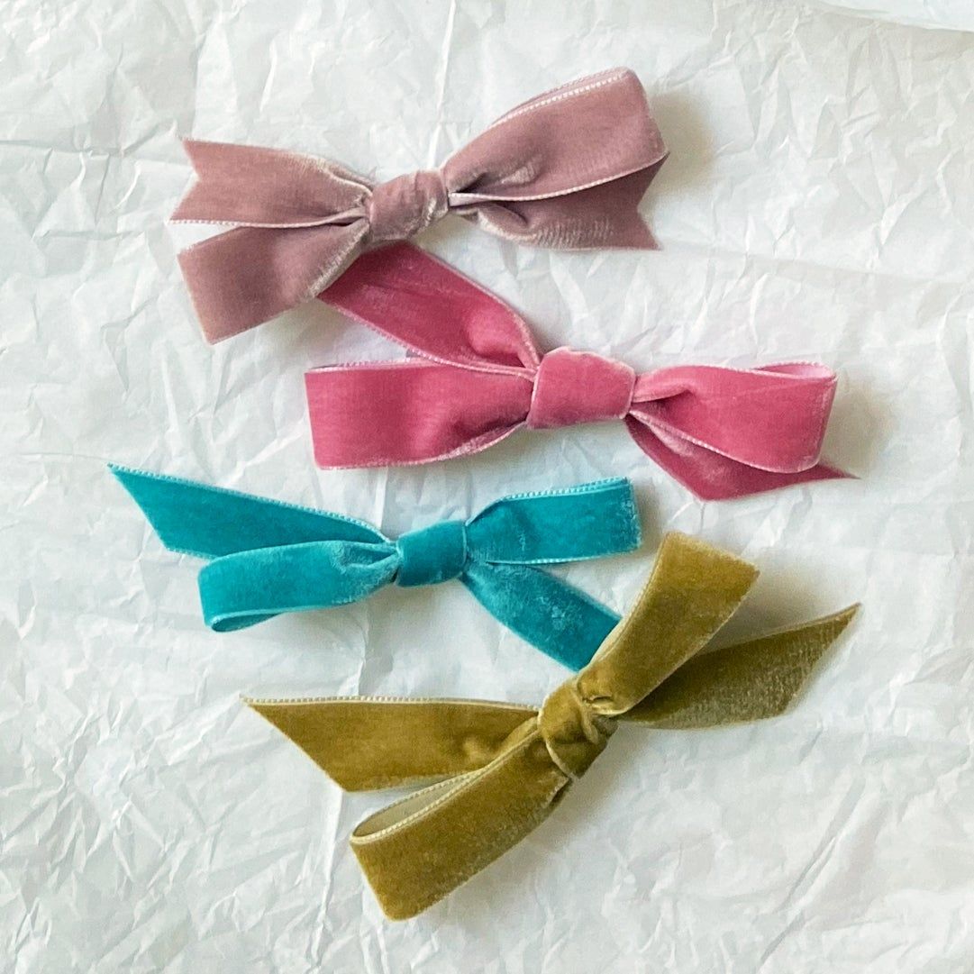 Christmas bows tied in velet