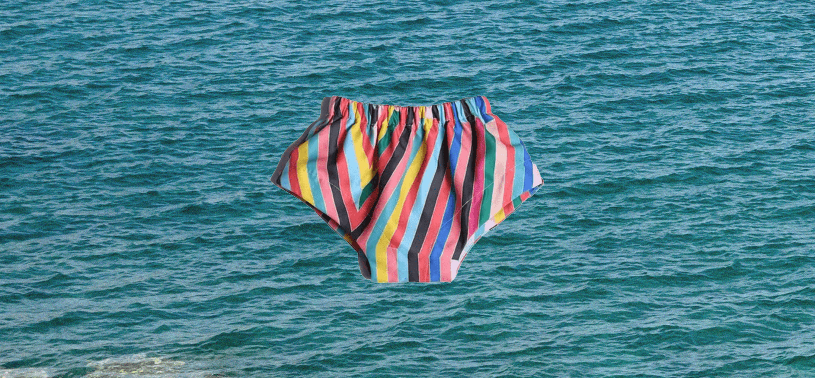 swim diaper and swim diaper covers for babies at the beach