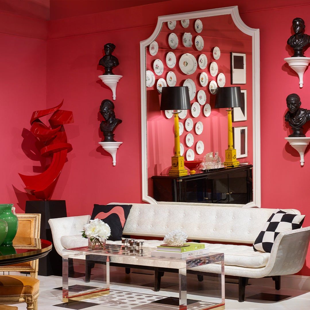 red wall with hung plates